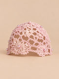 Turbante estivo traforato con perline, colore rosa, vista frontale nella foto del prodotto