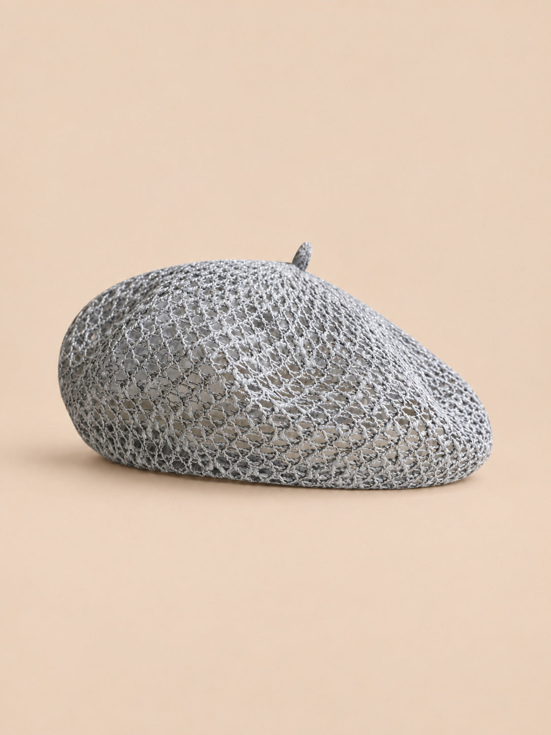 Basco da donna a forma di zucca, traforato in filato brillante, colore grigio, vista frontale