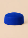 Basco elegante da donna in lana infeltrita da cerimonia, colore blu, parte superiore piatta, vista frontale