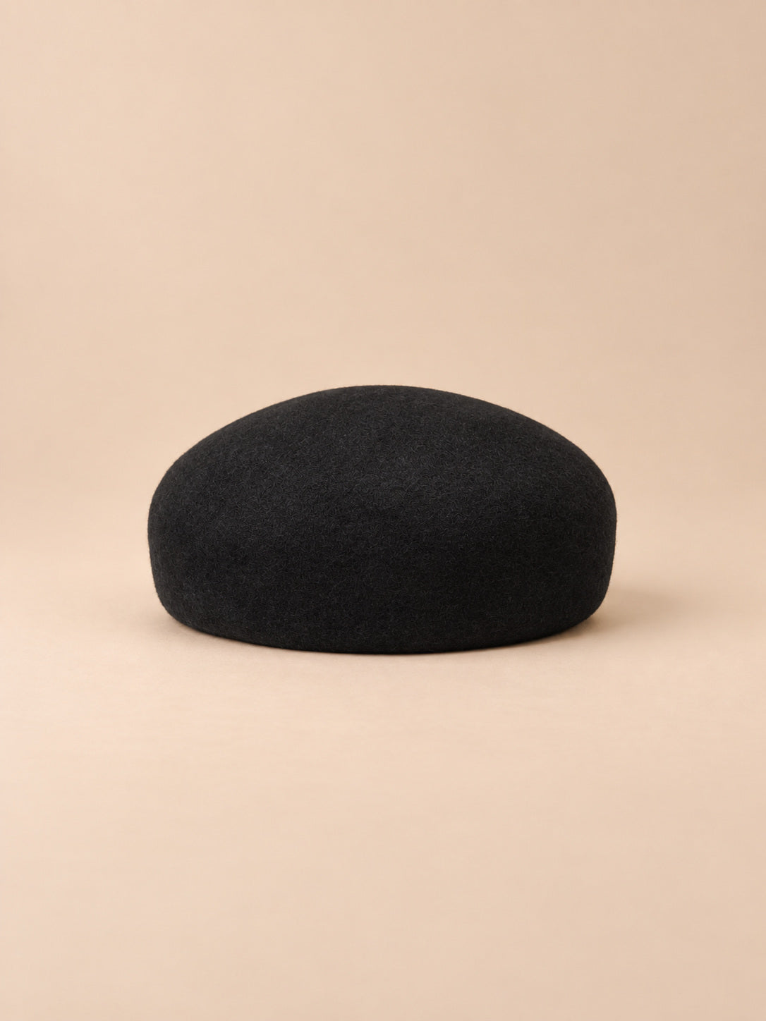 Basco elegante da donna in lana infeltrita da cerimonia, colore nero, forma rotonda, vista frontale