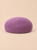 Basco elegante da donna in lana infeltrita da cerimonia, colore viola, forma rotonda, vista frontale
