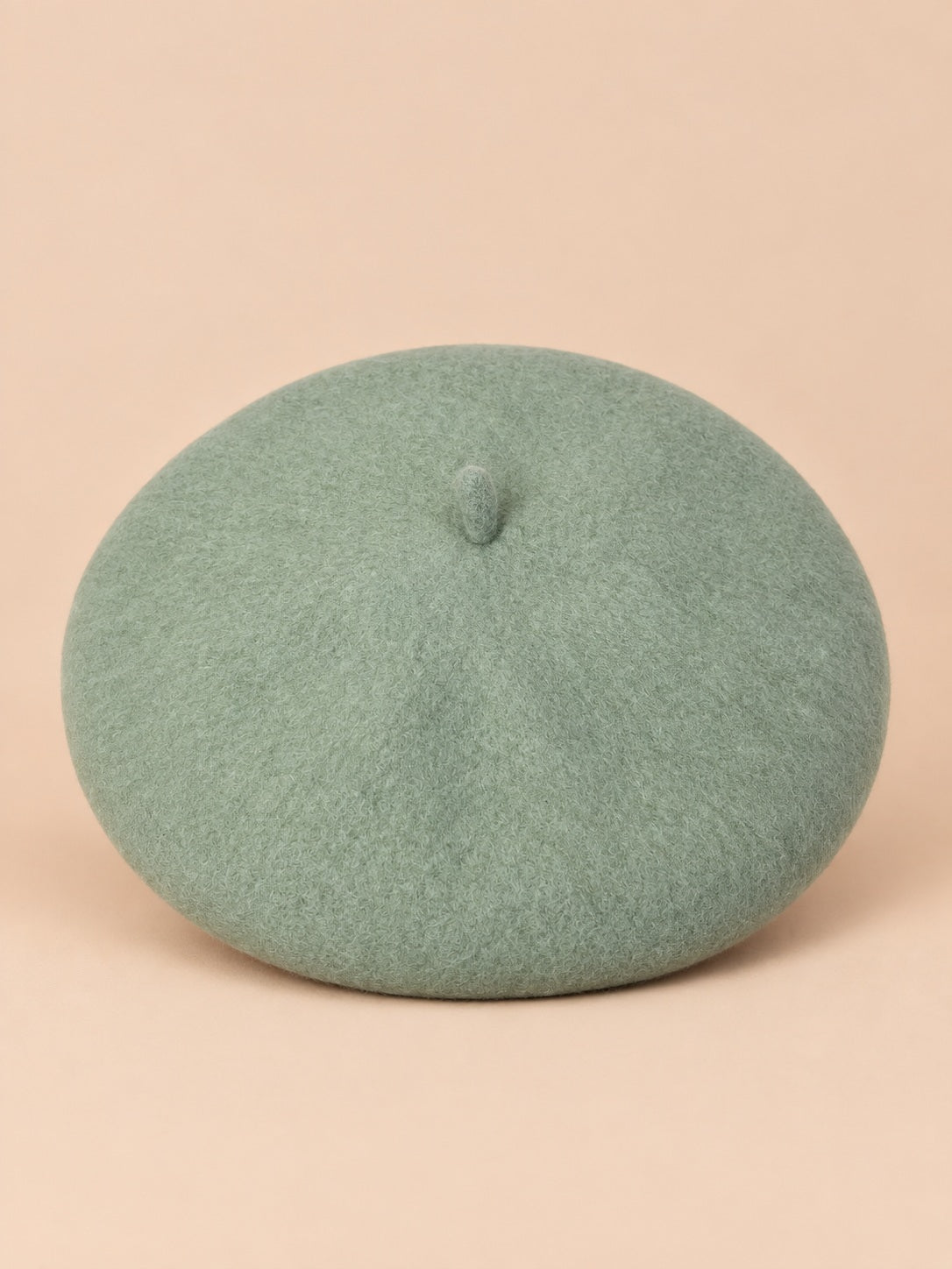 Basco francese da donna in pura lana, stile rétro, colore verde chiaro, vista frontale