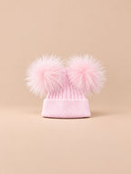 Berretto in misto cashmere con due pompon in pelliccia di procione, pompon abbinati, colore rosa, vista frontale