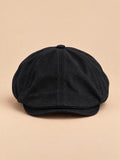 Cappello gavroche piatto vintage, stile britannico, colore nero, vista frontale nella foto del prodotto