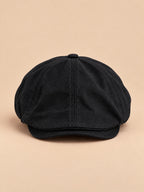 Cappello gavroche piatto vintage, stile britannico, colore nero, vista frontale nella foto del prodotto