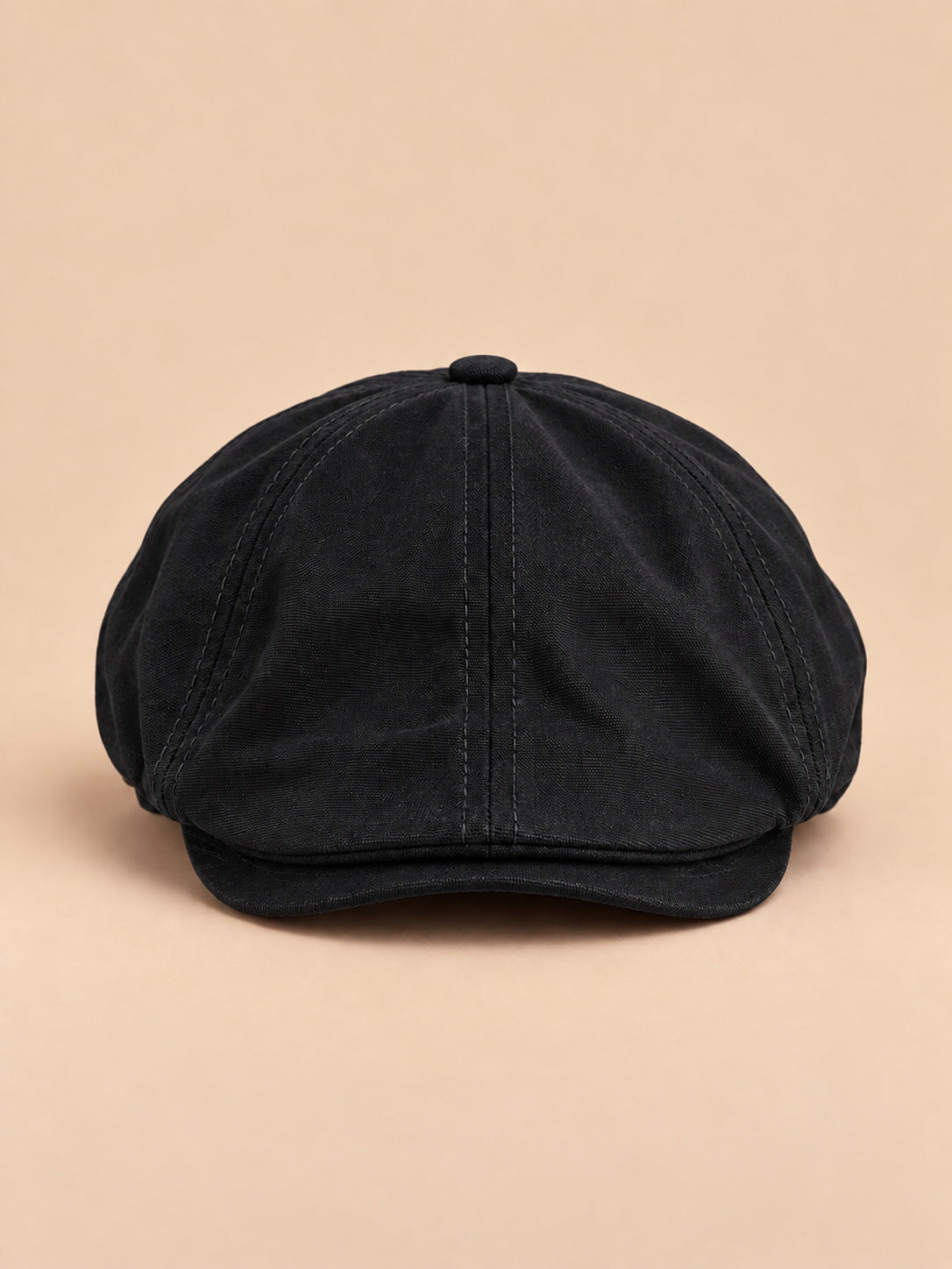 Cappello gavroche piatto vintage, stile britannico, colore nero, vista frontale nella foto del prodotto
