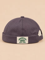 Berretto docker grigio BROOKLYN1631 senza visiera, con etichetta tessuta, stile vintage, vista frontale