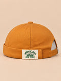 Berretto docker BROOKLYN1631 vintage con etichetta tessuta, colore giallo, vista frontale