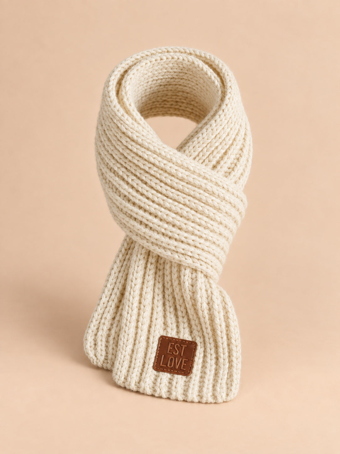 Sciarpa da bambino in maglia spessa con etichetta in pelle, colore beige, vista frontale