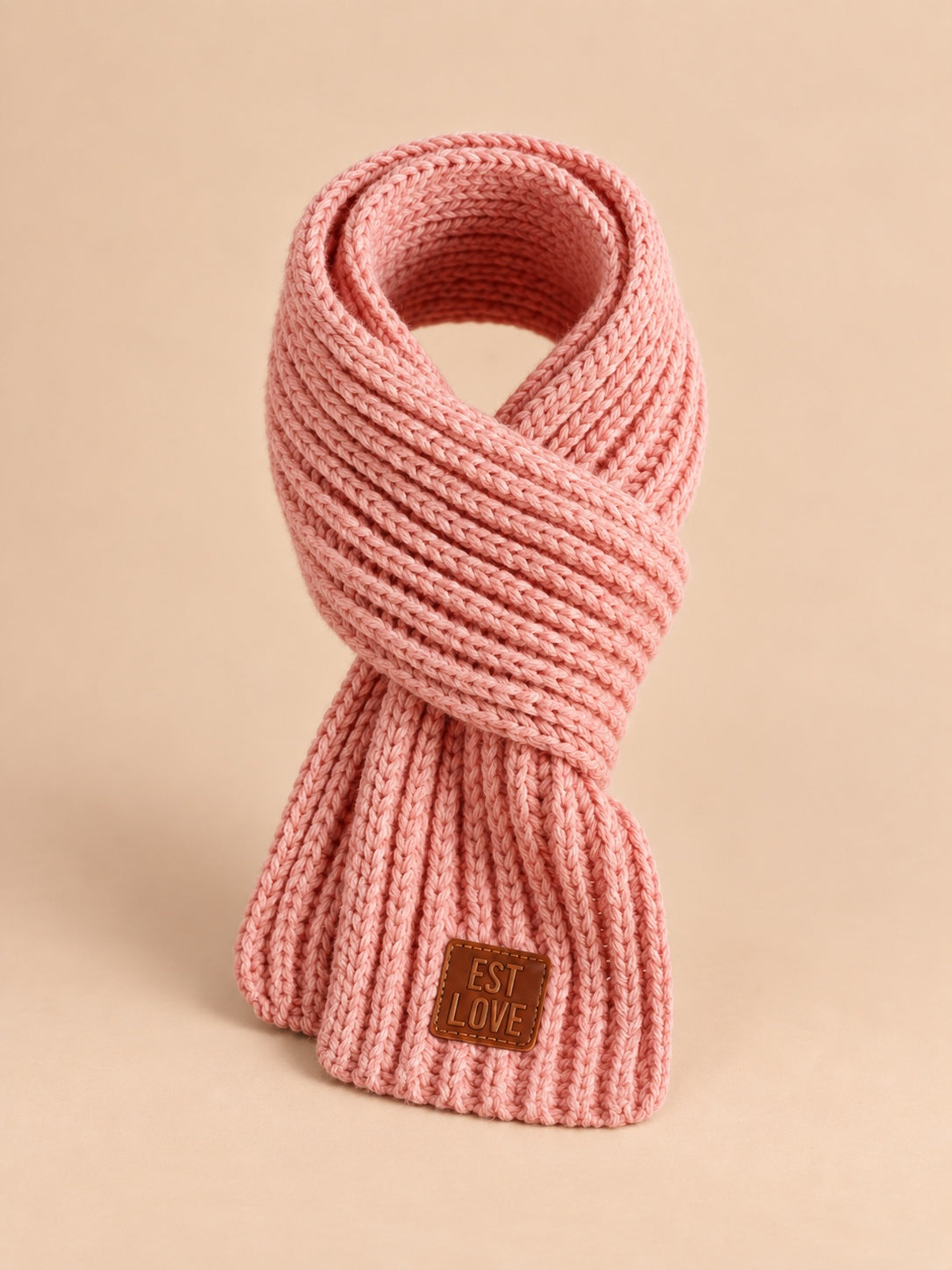 Sciarpa da bambino in maglia spessa con etichetta in pelle, colore rosa, vista frontale