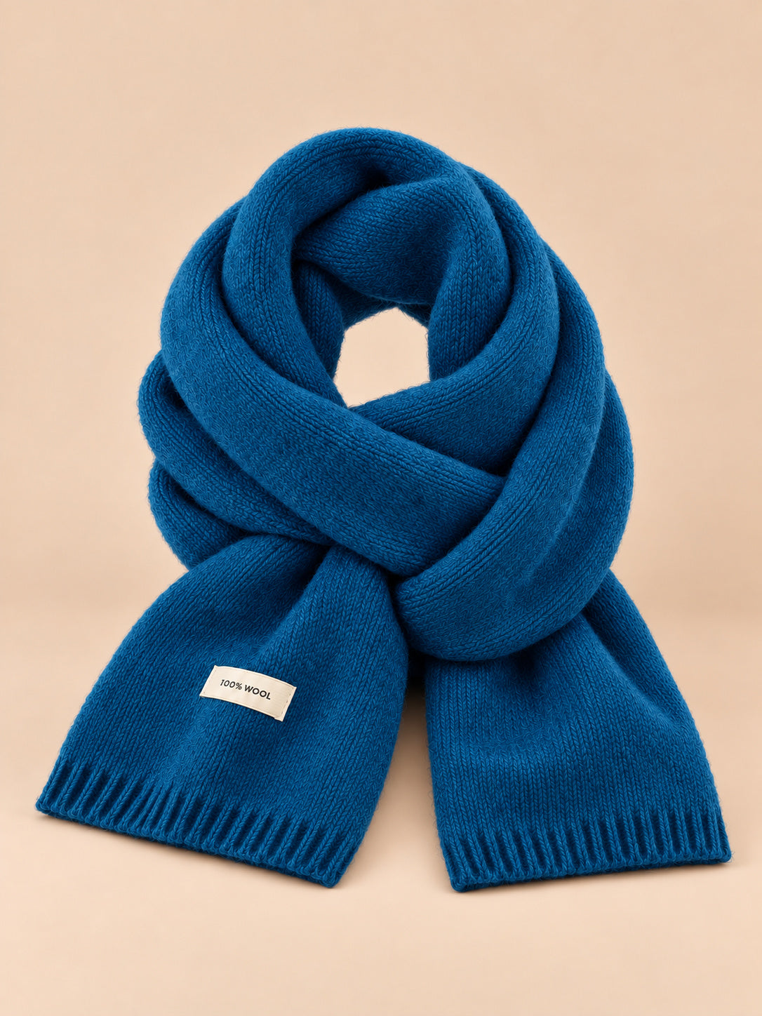 Sciarpa classica in maglia a tinta unita per l’inverno, colore blu pavone, vista frontale