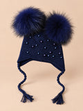 Berretto da bambino con due pompon in pelliccia di procione, pompon abbinati, colore blu navy, vista frontale