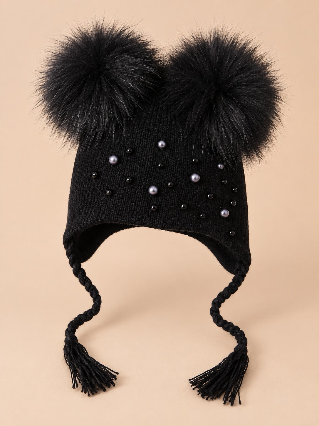 Berretto da bambino con due pompon in pelliccia di procione, pompon abbinati, colore nero, vista frontale
