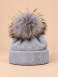 Berretto da bambino in misto lana con pompon in pelliccia, colore grigio chiaro, vista frontale