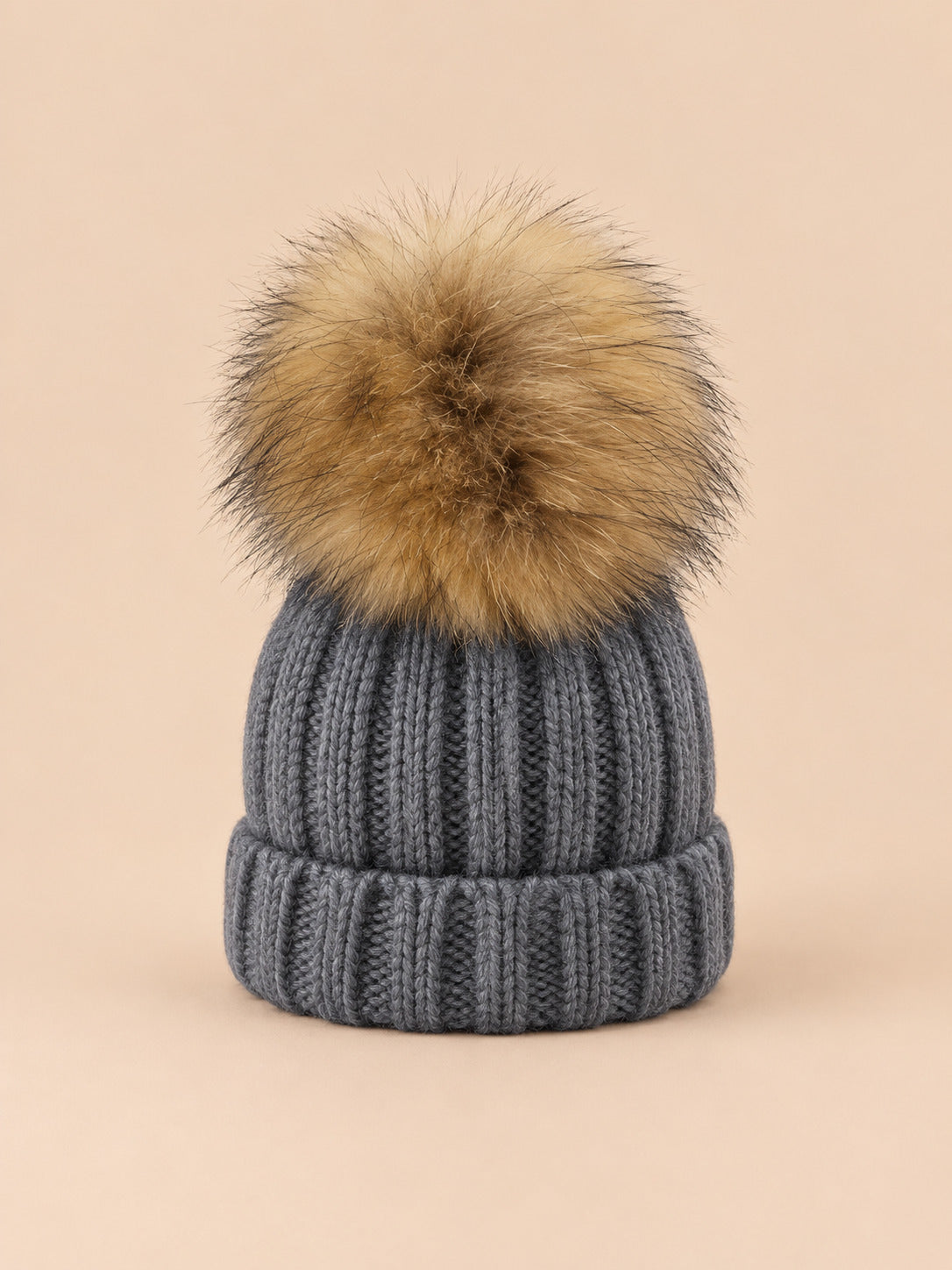 Set berretto e sciarpa da bambino con pompon in pelliccia, colore grigio, vista frontale