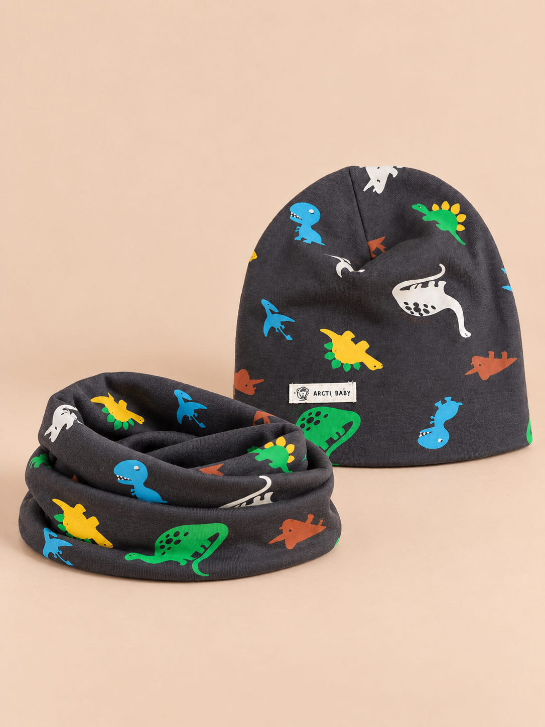 Set berretto e sciarpa da bambino con dinosauri, variante Dinosauro grande, fotografato di fronte