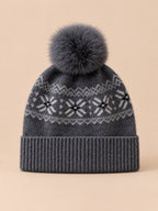 Berretto in cashmere con pompon e paraorecchie, colore grigio scuro, vista frontale
