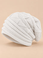 Berretto slouchy da donna ampio e caldo da sci, colore bianco, vista di tre quarti