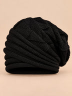 Berretto slouchy da donna ampio e caldo da sci, colore nero, vista frontale nella foto del prodotto