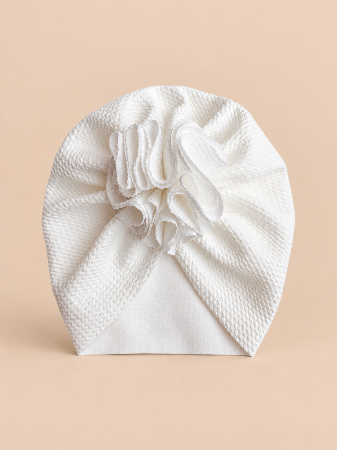 Turbante da neonata con fiore, dalla nascita, colore bianco, vista frontale nella foto del prodotto