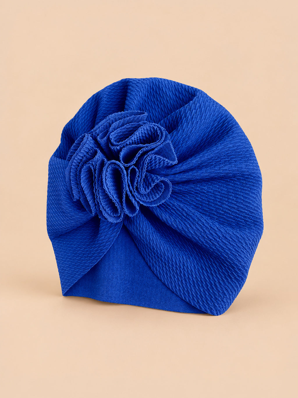 Turbante da neonata con fiore, dalla nascita, colore blu, vista di tre quarti nella foto del prodotto