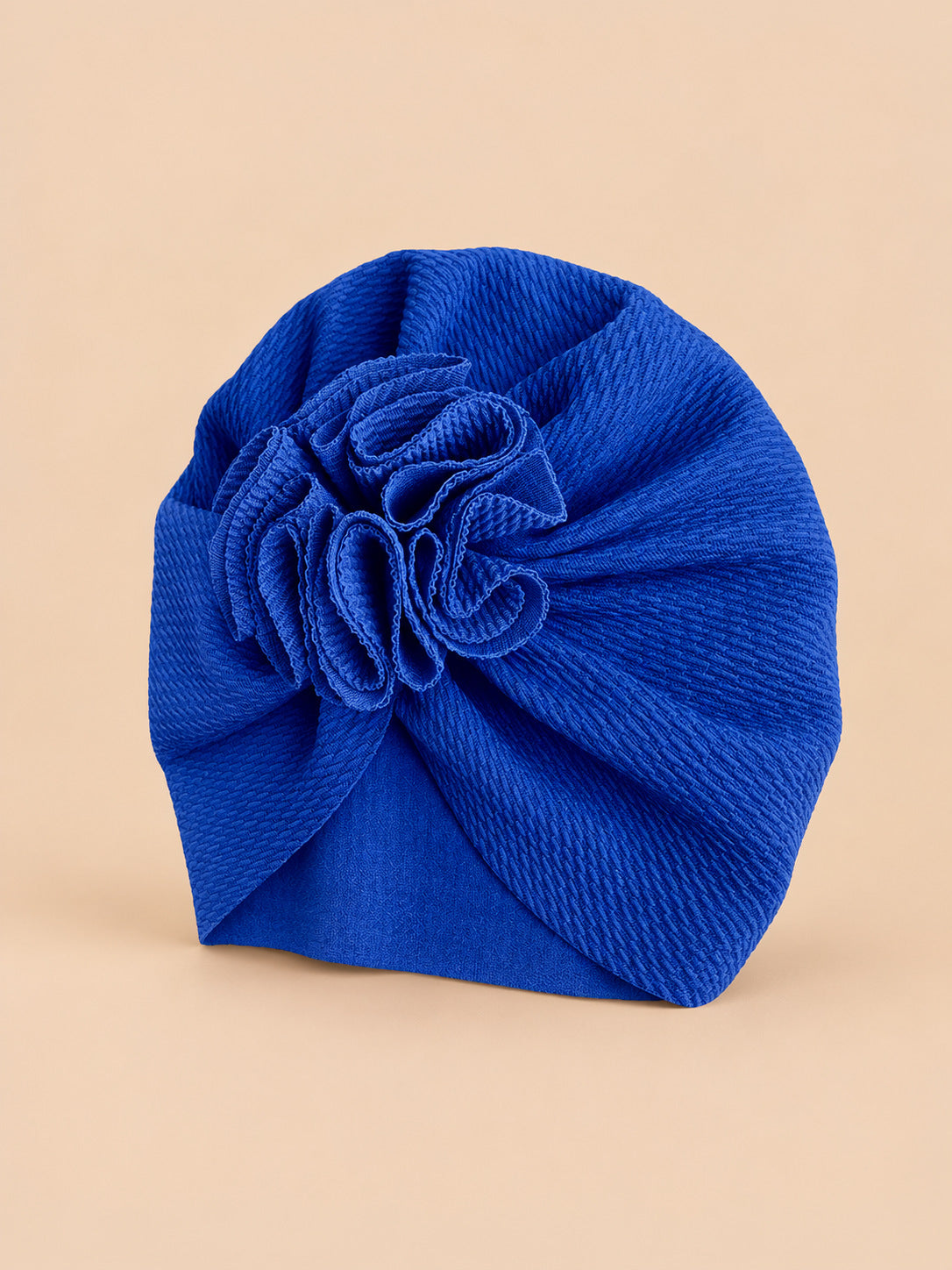 Turbante da neonata con fiore, dalla nascita, colore blu, vista di tre quarti nella foto del prodotto
