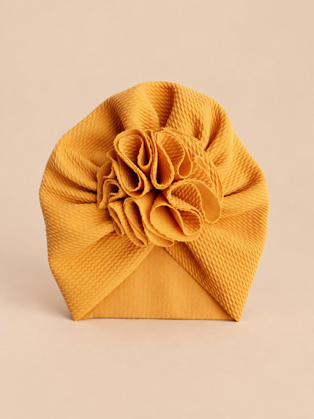 Turbante da neonata con fiore, dalla nascita, colore giallo, vista frontale nella foto del prodotto