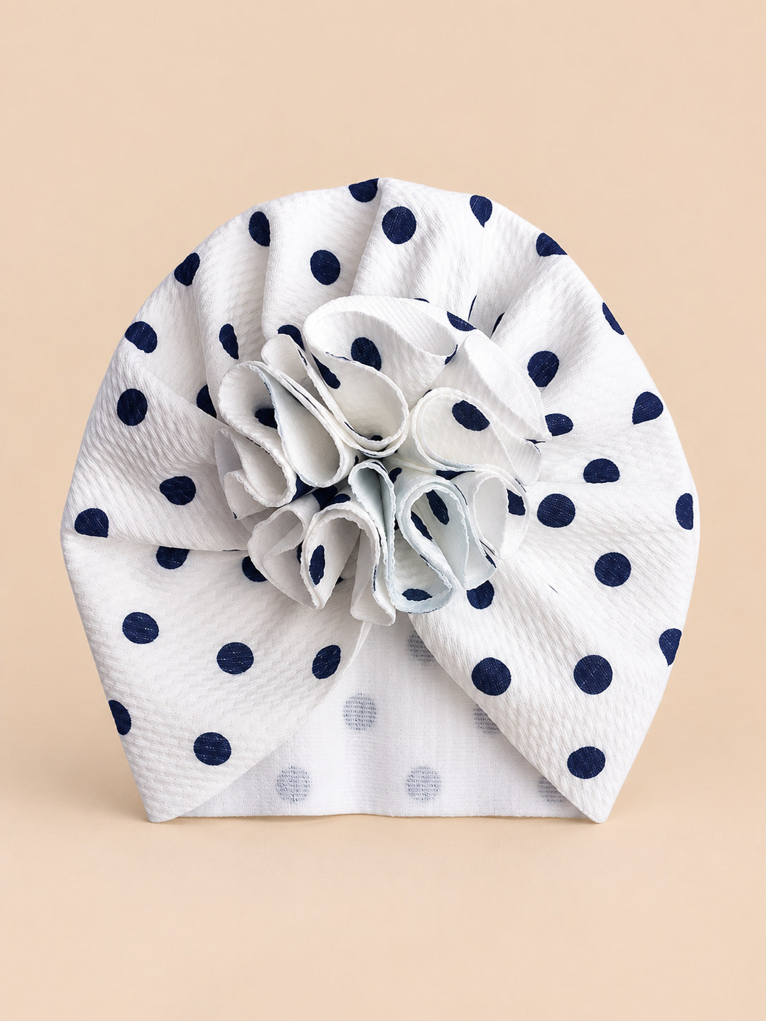 Turbante da neonata con fiore, dalla nascita, colore nero, motivo a pois, vista frontale