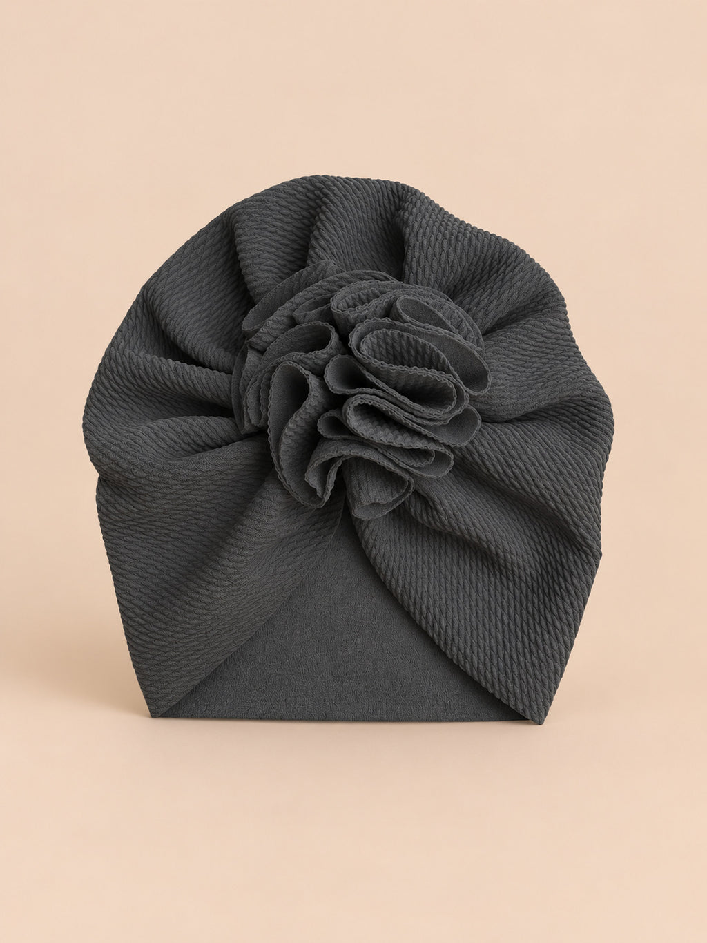 Turbante da neonata con fiore, dalla nascita, colore nero, vista frontale nella foto del prodotto
