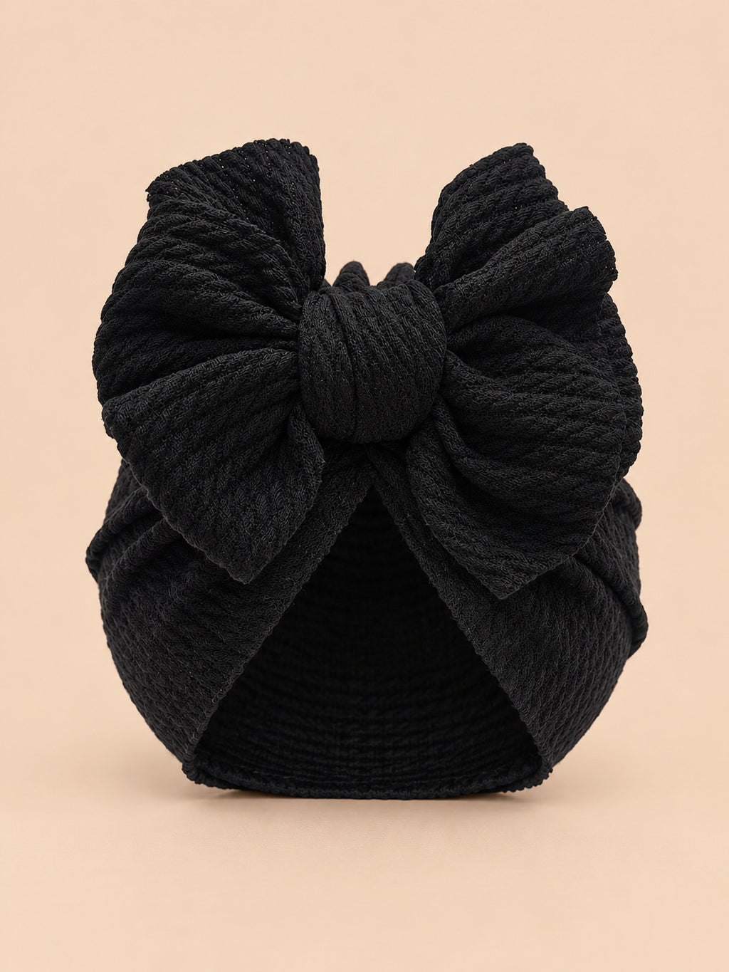Turbante nero da neonata con nodo, modello coordinato mamma e bambina, fotografato di fronte