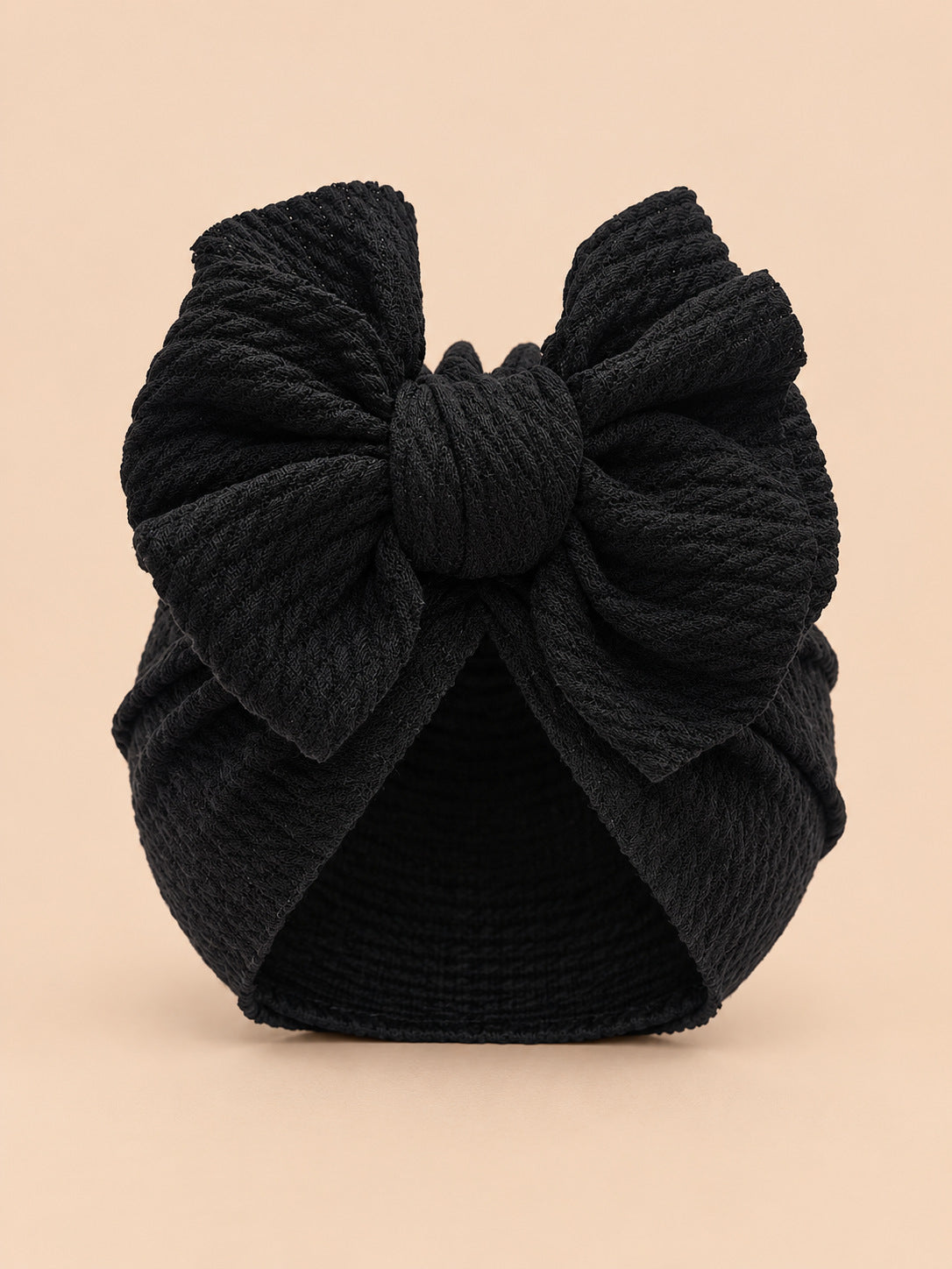 Turbante nero da neonata con nodo, modello coordinato mamma e bambina, fotografato di fronte