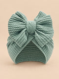 Turbante annodato da neonata coordinato mamma e bambina, colore verde, vista frontale