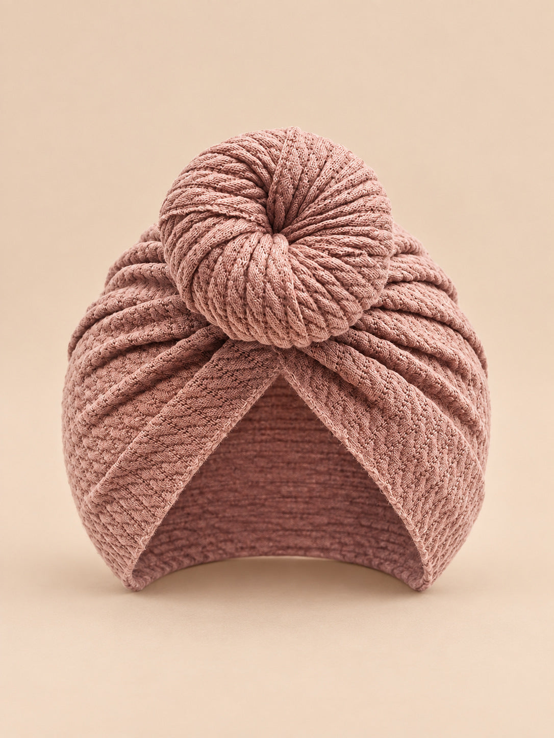 Turbante annodato da neonata coordinato mamma e bambina, colore rosa antico, vista frontale