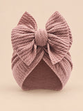 Turbante annodato da neonata coordinato mamma e bambina, colore rosa antico, vista frontale