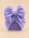 Turbante annodato da neonata coordinato mamma e bambina, colore viola, vista frontale