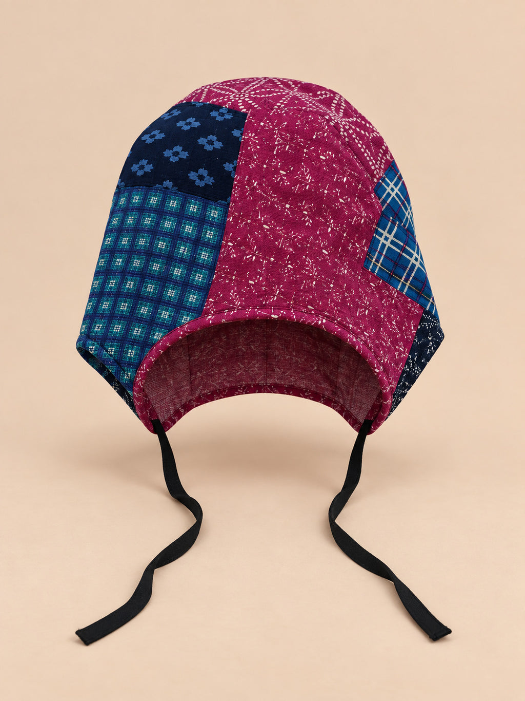 Turbante da donna in tessuto patchwork con nodo bicolore a forma di fiore, modello 2, vista frontale