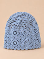 Turbante da donna a rete a coste – 6 colori, colore blu, vista frontale, su sfondo color sabbia e pesca