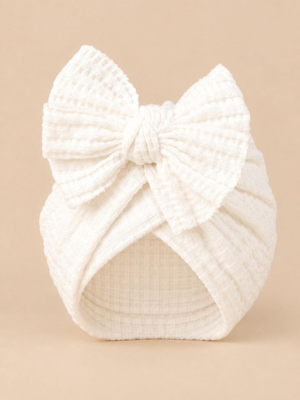 Turbante da neonata con fiocco in cotone lavorato a maglia, colore bianco, vista frontale