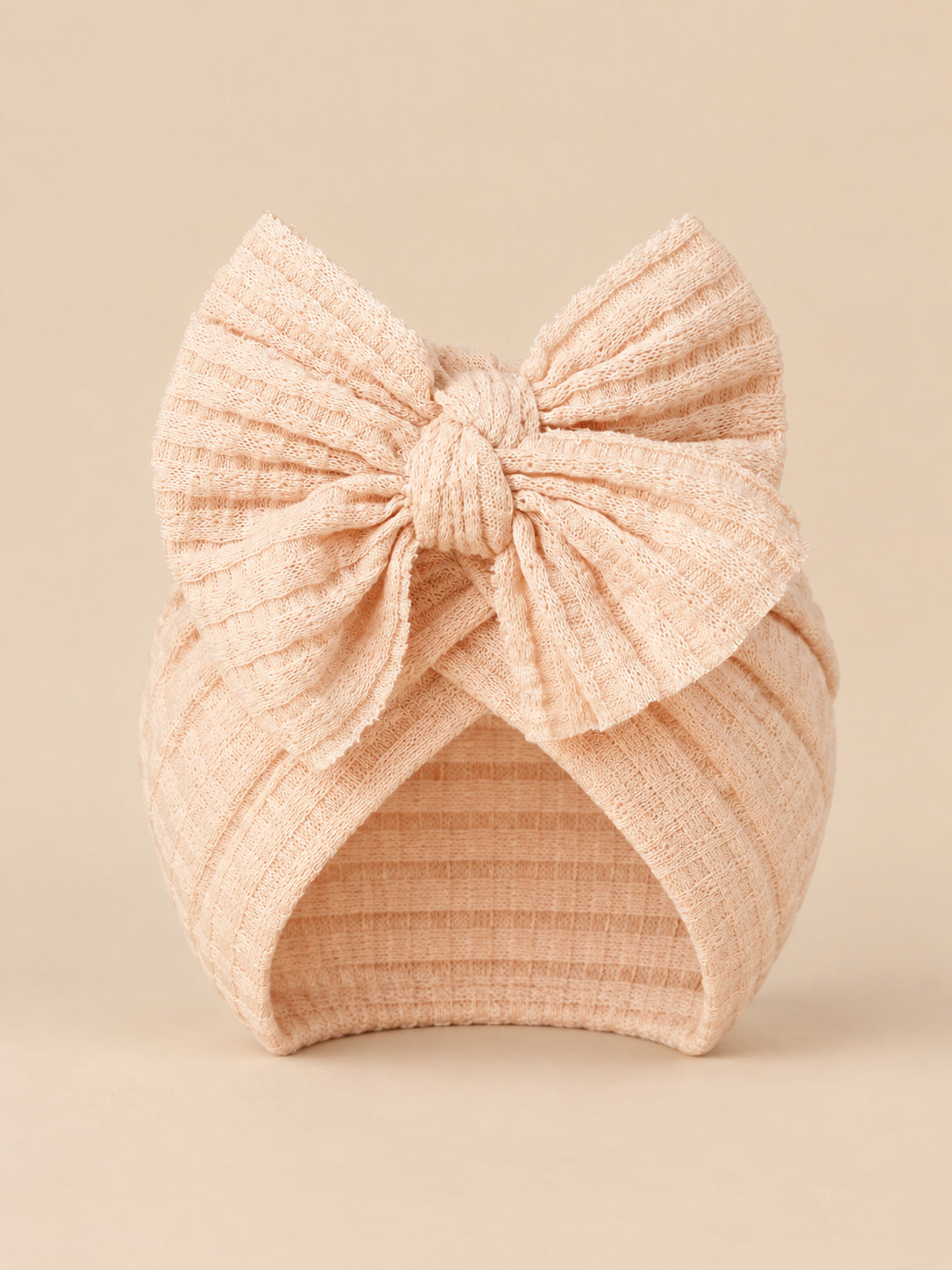 Turbante da neonata con fiocco in cotone lavorato a maglia, colore rosa, vista frontale